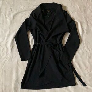 Revamped brand wrap style top with belt..  Size M